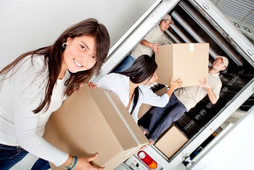 Office furniture and equipment arranged for storage moving