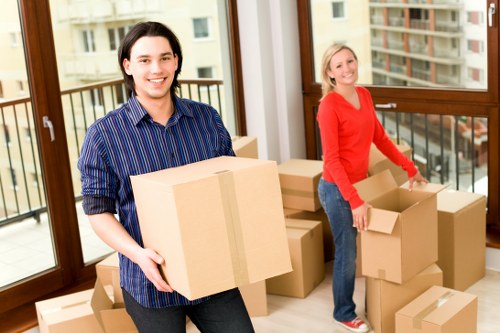 Experienced movers handling furniture in Canary Wharf